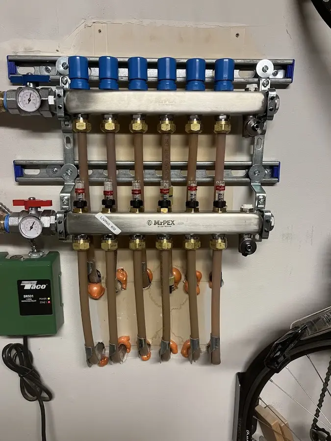 Plumber performing Water Heater Repair at a residential property in Fort Mill